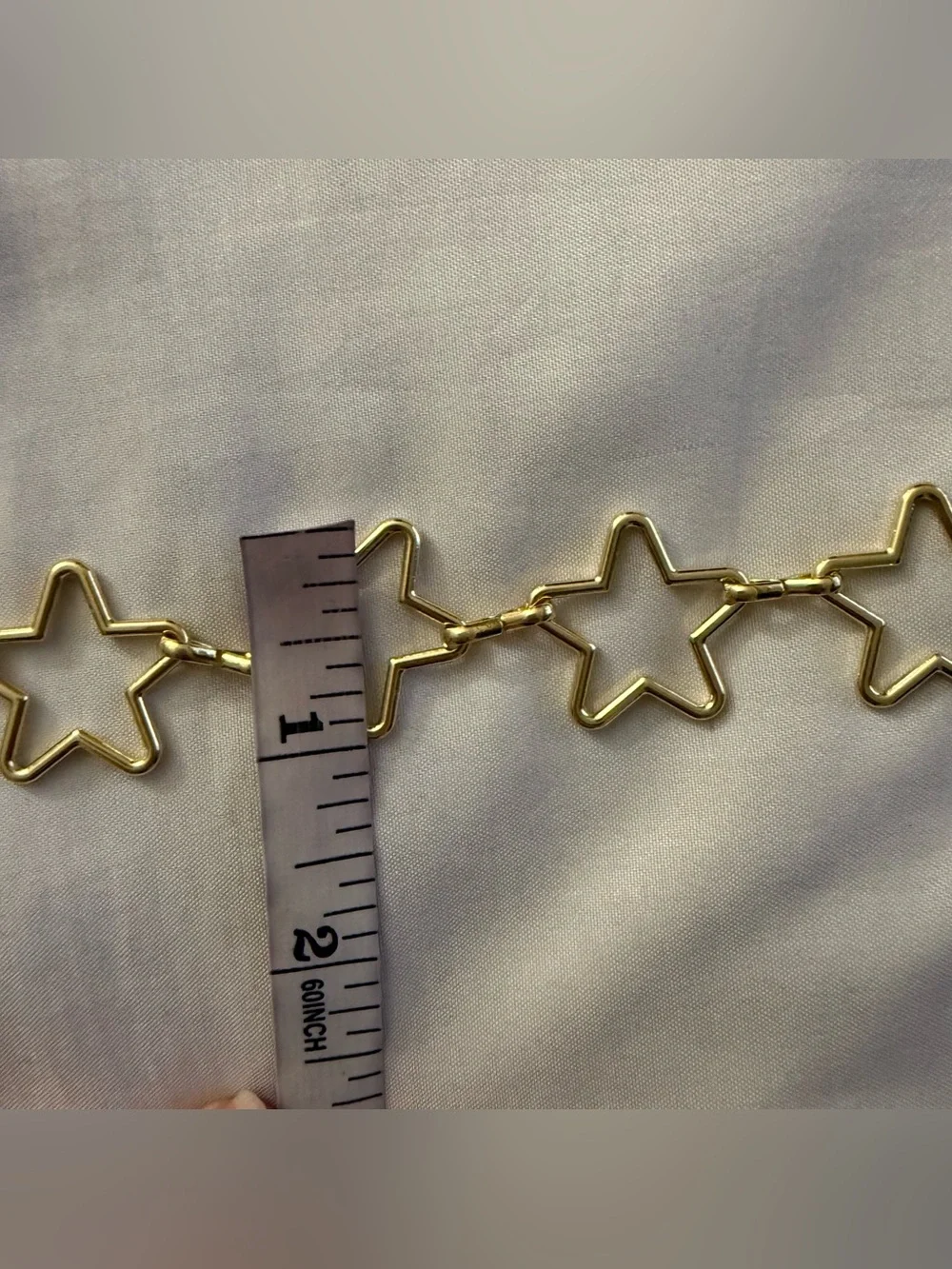 Gold tone star shaped chain belt
